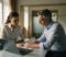 gp practice manager and gp partner reviewing documents together in a modern nhs surgery meeting room gp practice manager and gp partner reviewing documents together in a modern nhs surgery meeting room