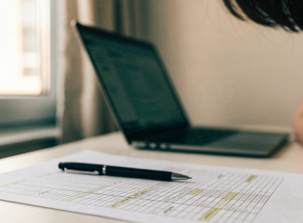 practice manager reviewing a cqc quality statement scoring table