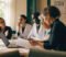 primary care network clinical director and practice managers reviewing governance documents in a meeting room primary care network clinical director and practice managers reviewing governance documents in a meeting room