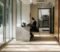cqc compliance for dental practices Dental practice manager reviewing CQC compliance documentation at reception desk