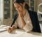 A dental associate reviewing the terms of an associate agreement before signing