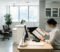 illegal dental partnerships: gdc registration A dental practice owner reviewing GDC registration documentation for practice partners