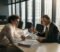 dental practice incorporation and cgt A dentist and an adviser discussing incorporation and tax planning for a dental practice