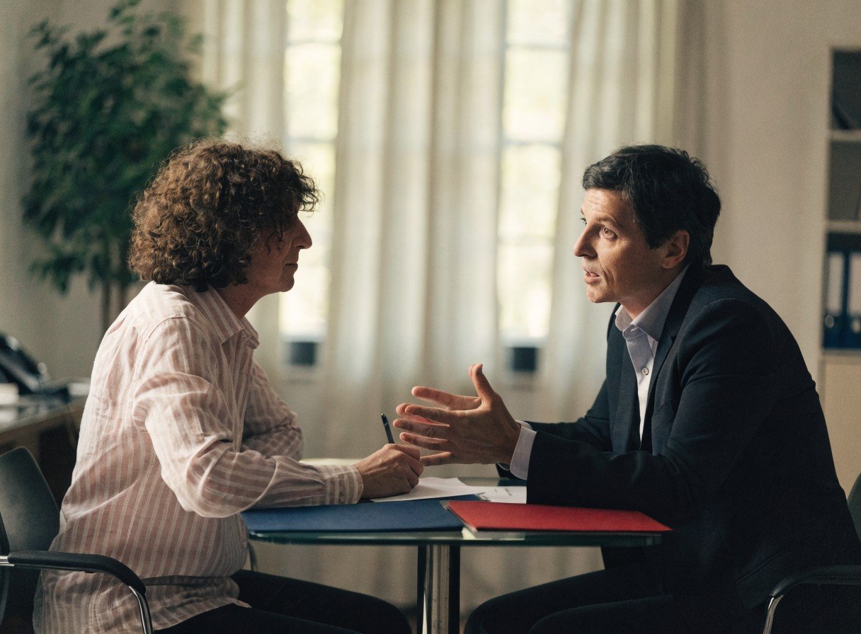 Dental practice owner discussing regulatory obligations with an adviser