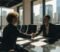 Dentist and solicitor shaking hands after agreeing terms to buy a dental practice