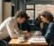 legal advice for startups: founders reviewing documents Two startup founders reviewing legal paperwork together at a desk in a London co-working office