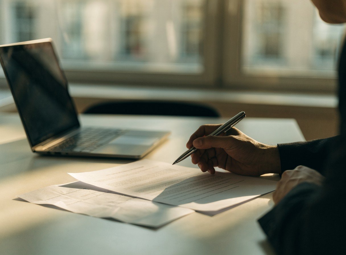 Employment solicitor reviewing dismissal documents ahead of a tribunal claim