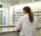 Pharmacist checking a prescription at the dispensing bench of an independent community pharmacy